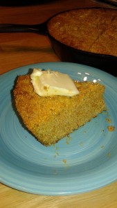 a slice of coarse rustic cornbread